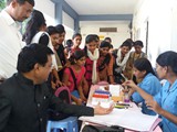 PRINCIPAL DR. R.K.PARDESHI SUPERVISES THE HB AND BLOOD TEST CAMP BY NSS UNIT